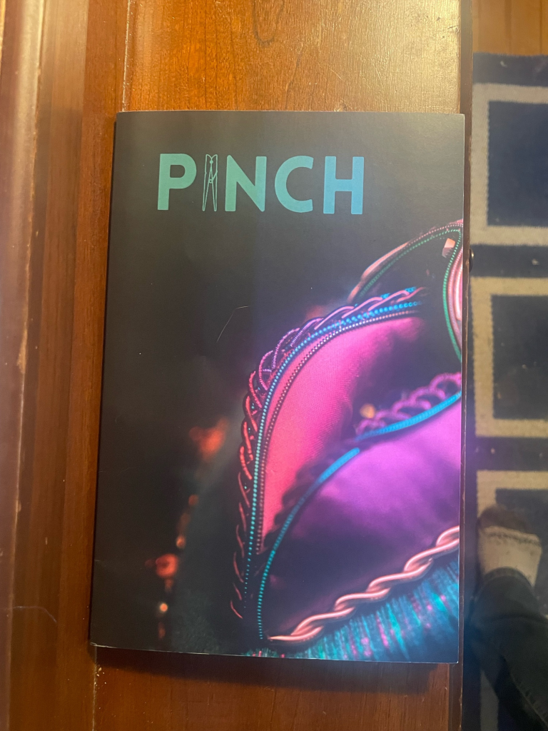 The Pinch issue 44.2, with a purple and teal vulvar-shaped object on the cover and the name PINCH at upper left in teal sans-serif capitals with an outline of a clothespin for the I.